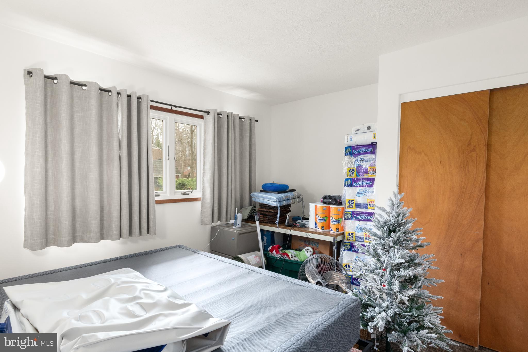 1403 Ellenglen Road Towson, MD 21286 - Photo 27 of 40 a bedroom with a bed and a window