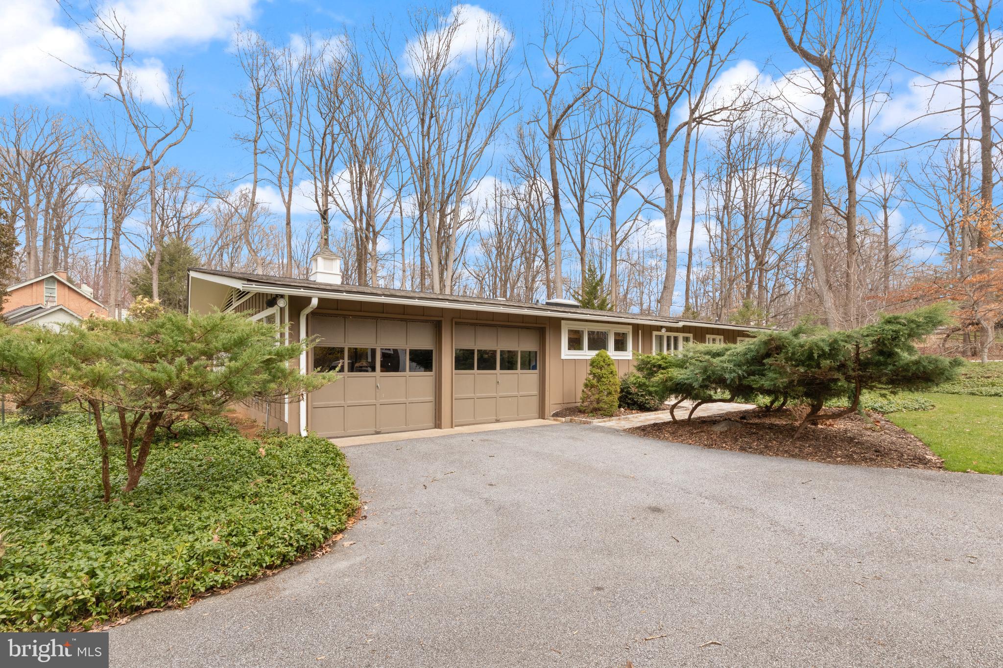 1403 Ellenglen Road Towson, MD 21286 - Photo 33 of 40 front view of a house with a garden