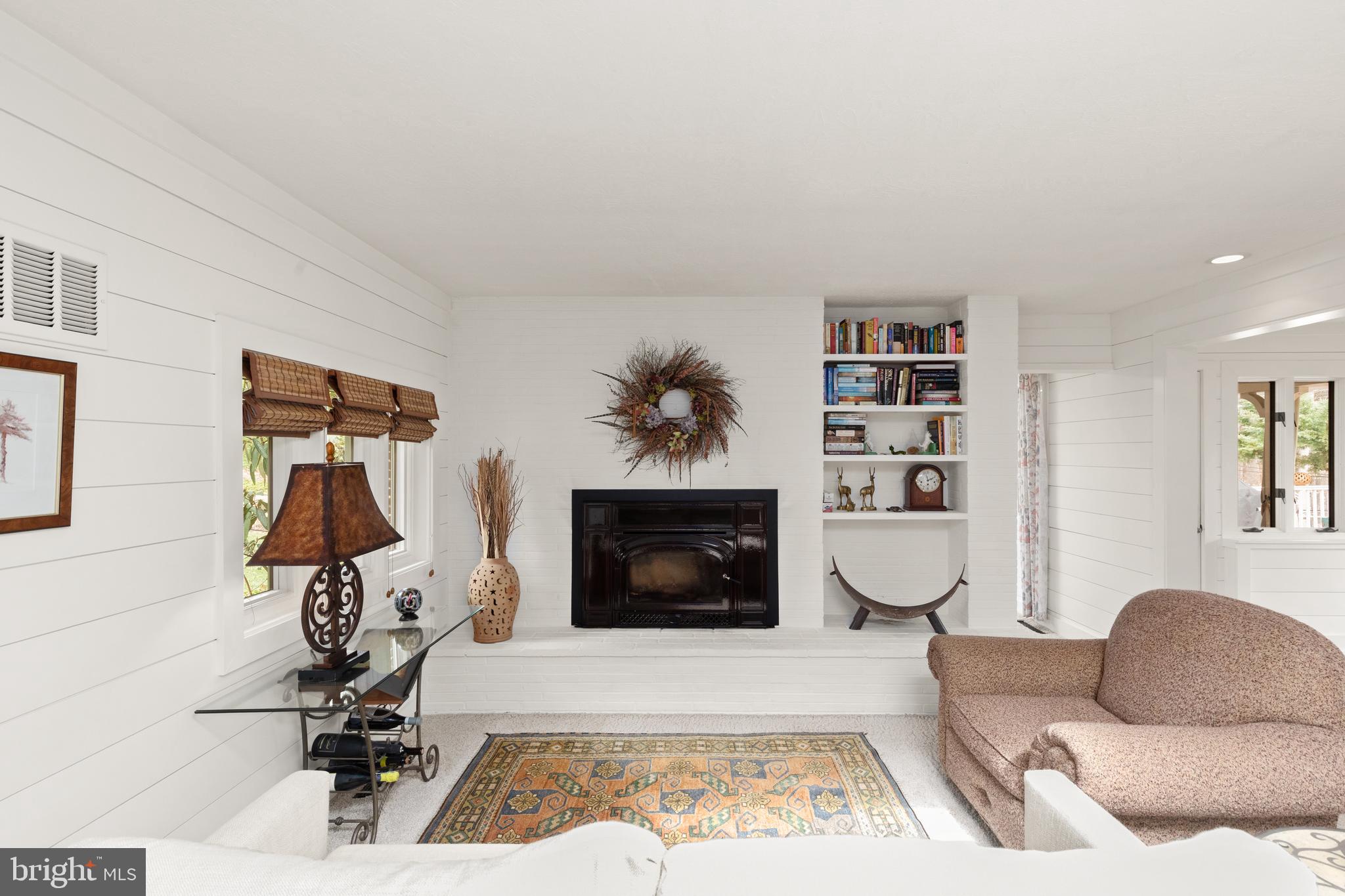 1403 Ellenglen Road Towson, MD 21286 - Photo 6 of 40 a living room with furniture a rug and a window
