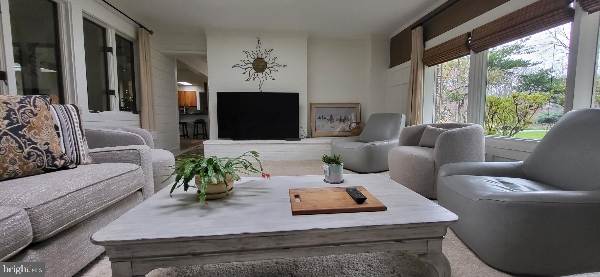 1403 Ellenglen Road Towson, MD 21286 - Photo 7 of 40 a living room with furniture fireplace and a large window