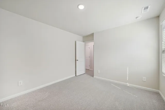 a view of storage and utility room with washer and dryer
