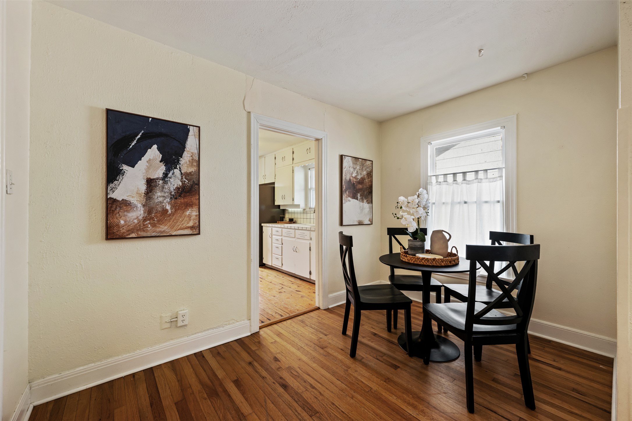 813 East 48th Street Austin, TX 78751 - Photo 12 of 37 a view of a room with furniture and wooden floor