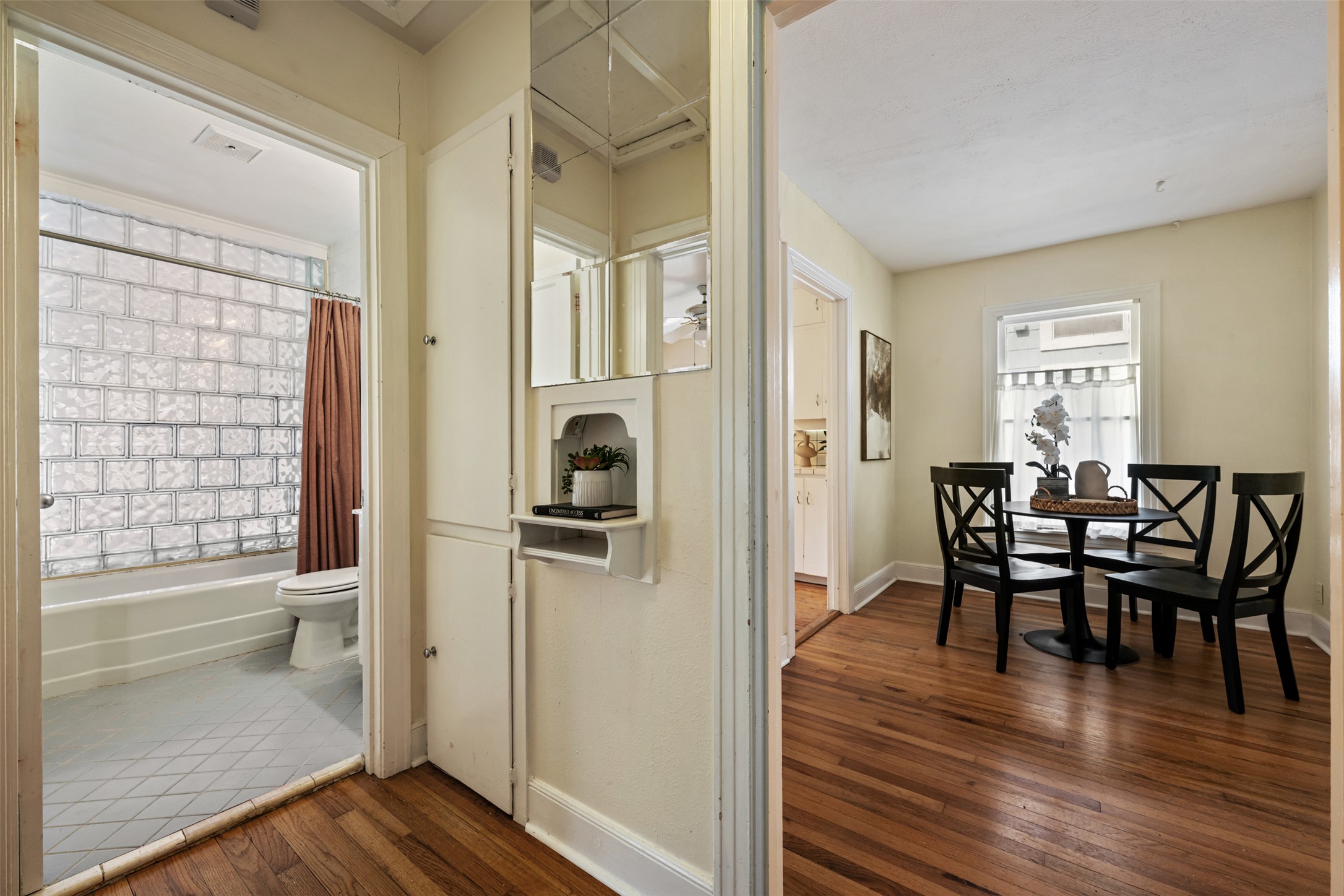 813 East 48th Street Austin, TX 78751 - Photo 22 of 37 a view of a dining room with furniture and wooden floor