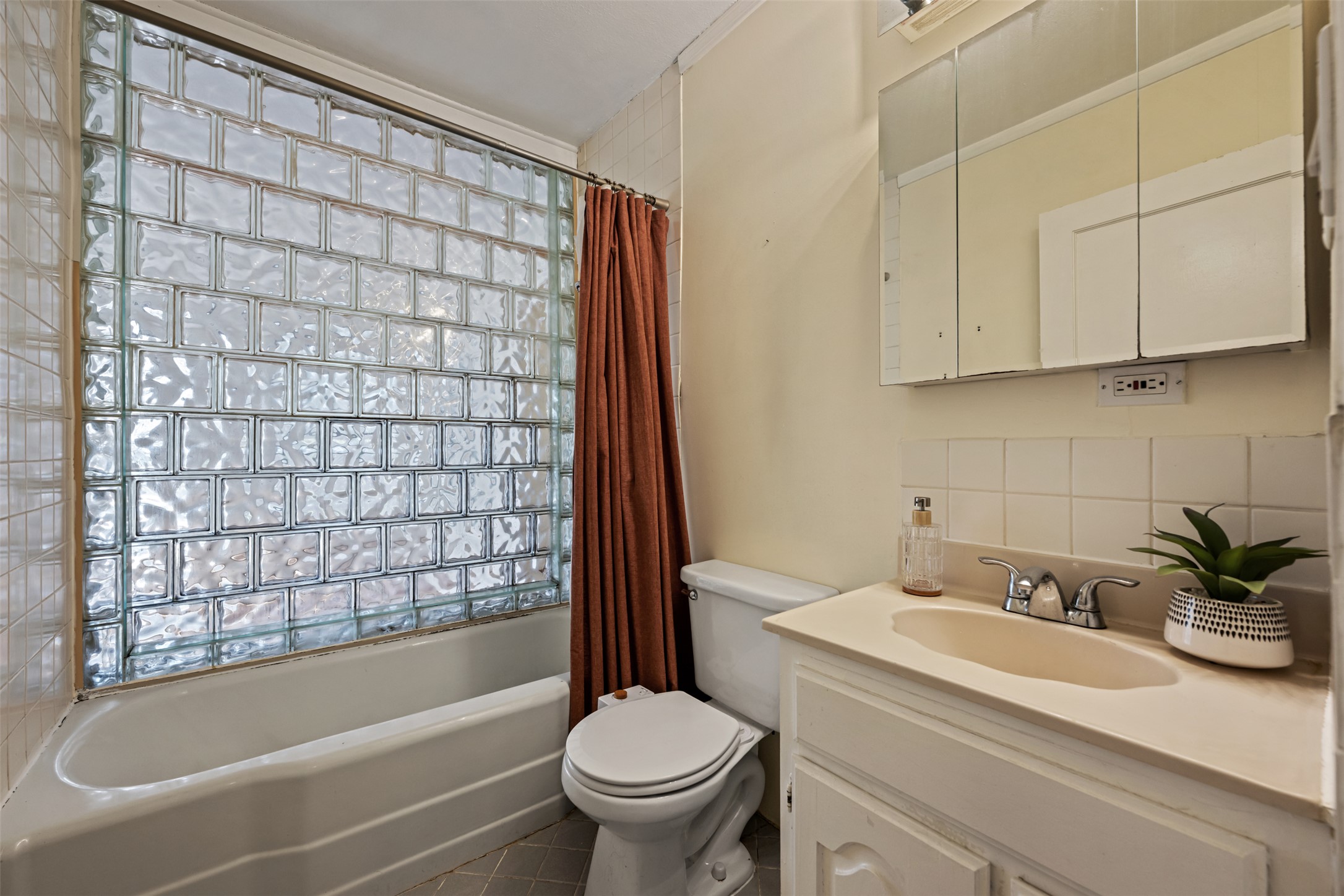 813 East 48th Street Austin, TX 78751 - Photo 23 of 37 a bathroom with a sink toilet and shower