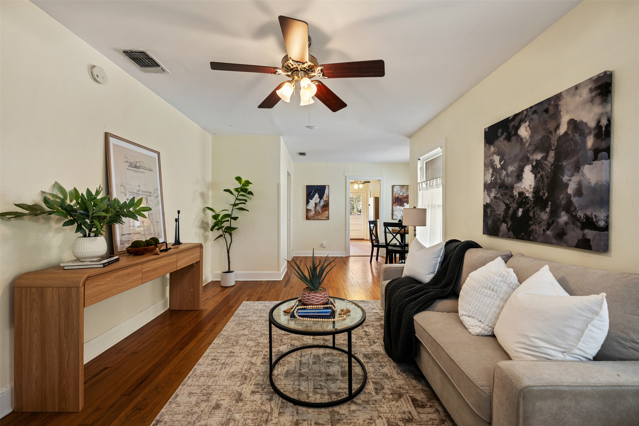 813 East 48th Street Austin, TX 78751 - Photo 8 of 37 a living room with furniture and a potted plant