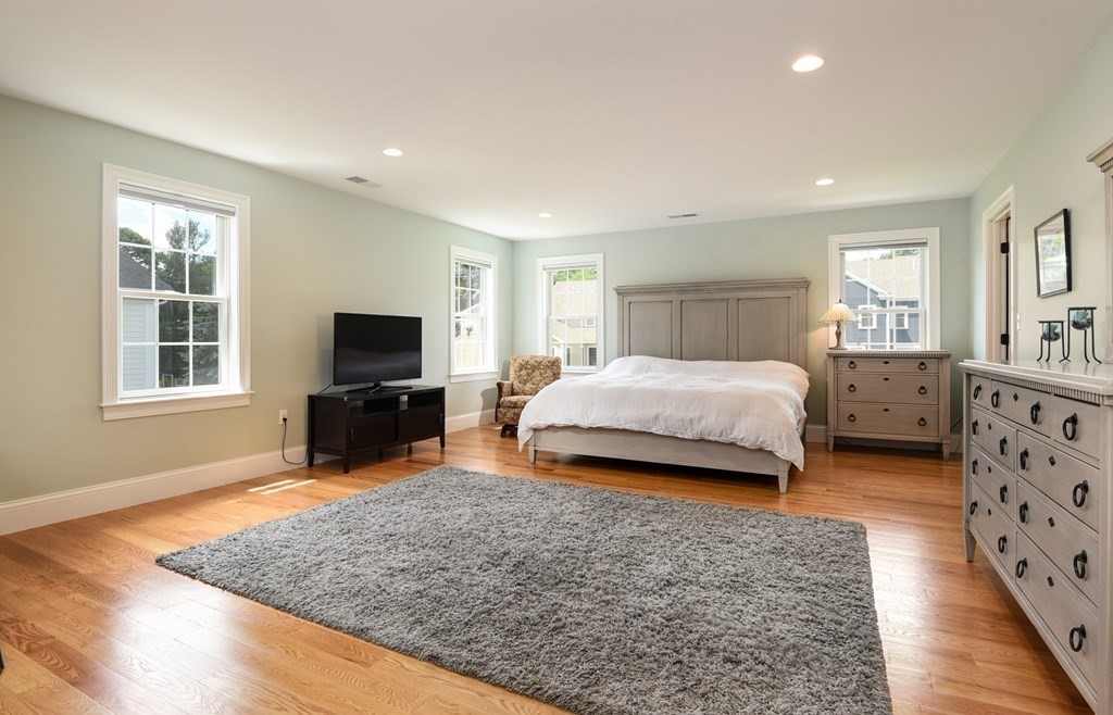 221 Valley Road Needham, MA 02492 - Photo 23 of 42 a bedroom with a bed and a television