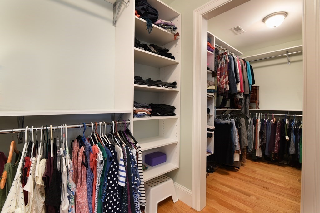 221 Valley Road Needham, MA 02492 - Photo 24 of 42 a view of walk in closet with clothes and shoes