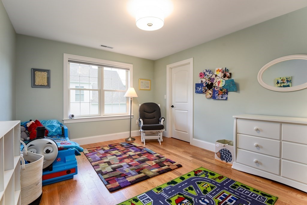 221 Valley Road Needham, MA 02492 - Photo 33 of 42 a bedroom with a bed and a window