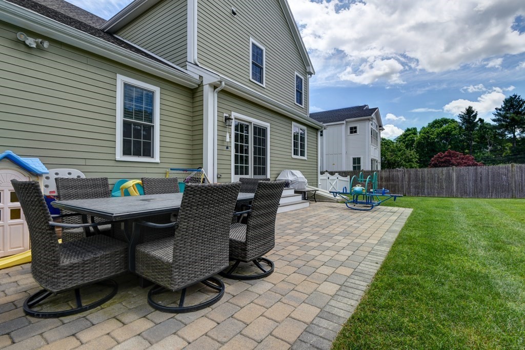221 Valley Road Needham, MA 02492 - Photo 36 of 42 a view of a house with backyard and sitting area