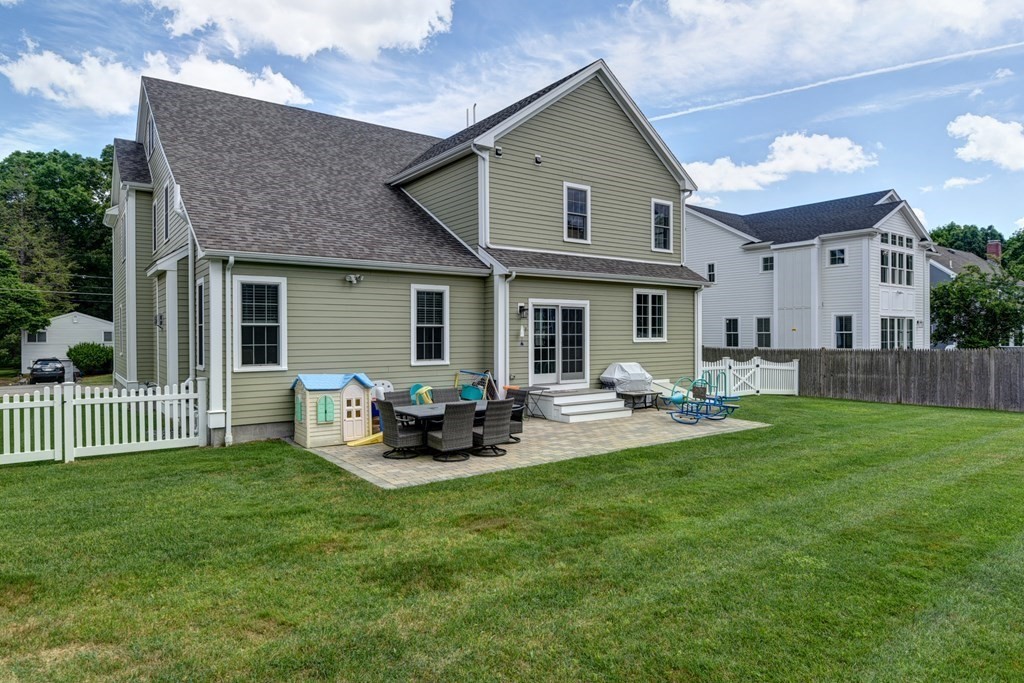 221 Valley Road Needham, MA 02492 - Photo 38 of 42 a front view of house with yard and green space