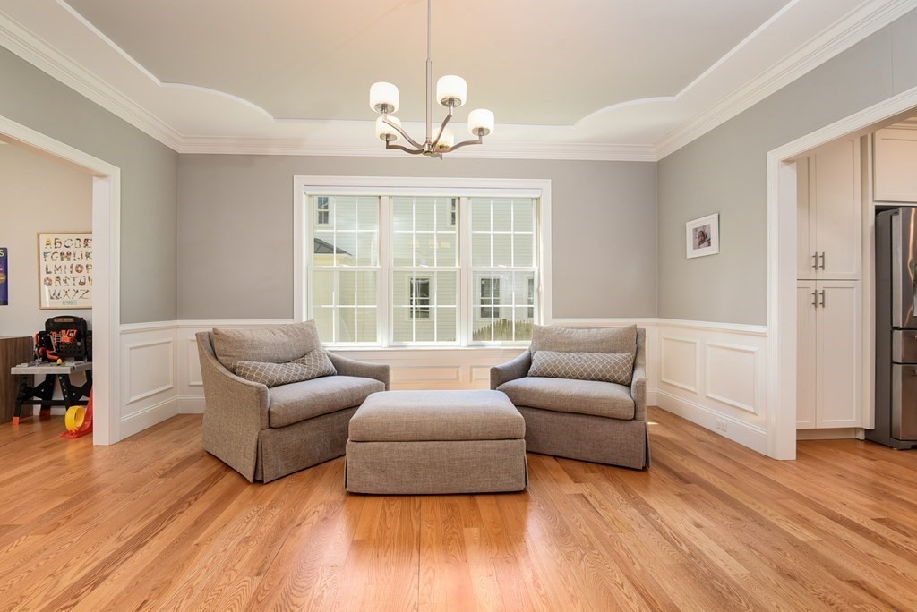 221 Valley Road Needham, MA 02492 - Photo 7 of 42 a living room with furniture and a large window