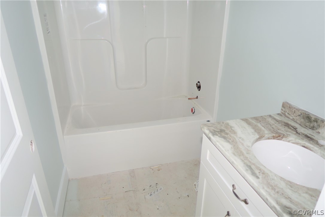 3824 Wood Dale Road Chester, VA 23831 - Photo 10 of 13 a bathroom with a granite countertop sink and a mirror