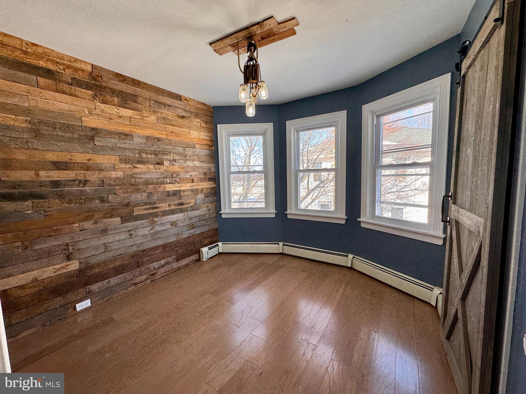 706 Main Street Red Hill, PA 18076 - Photo 16 of 34 Charming room with rustic wood accents