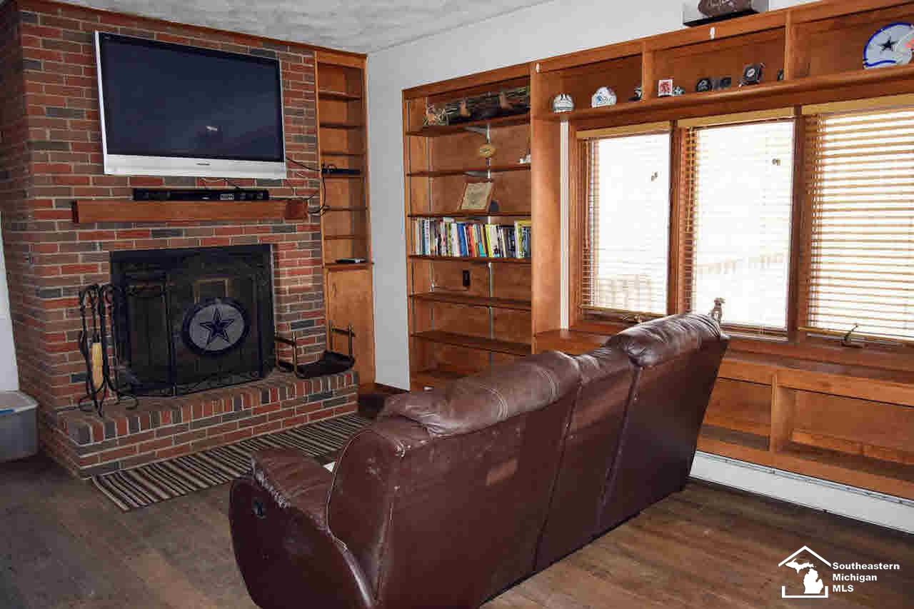 10200 Crabb Road Temperance, MI 48182 - Photo 12 of 25 Den/Family RM W/Fireplace