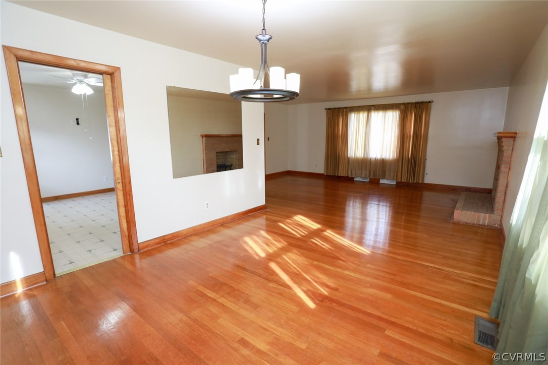 1102 Arlington Road Hopewell, VA 23860 - Photo 23 of 50 a view of a room with wooden floor and staircase