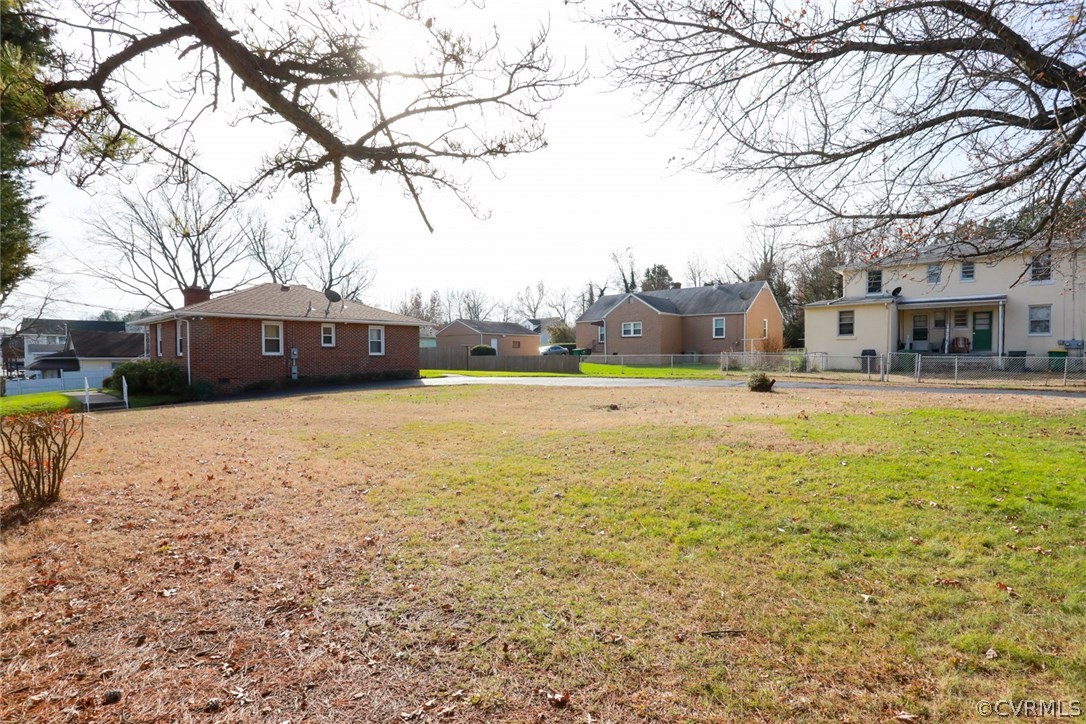 1102 Arlington Road Hopewell, VA 23860 - Photo 40 of 50 a view of residential houses with yard and swimming pool