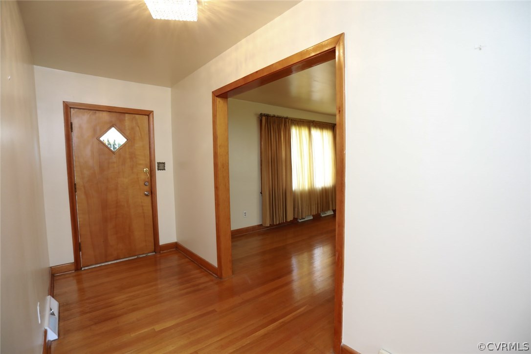 1102 Arlington Road Hopewell, VA 23860 - Photo 8 of 50 a view of a hallway with wooden floor