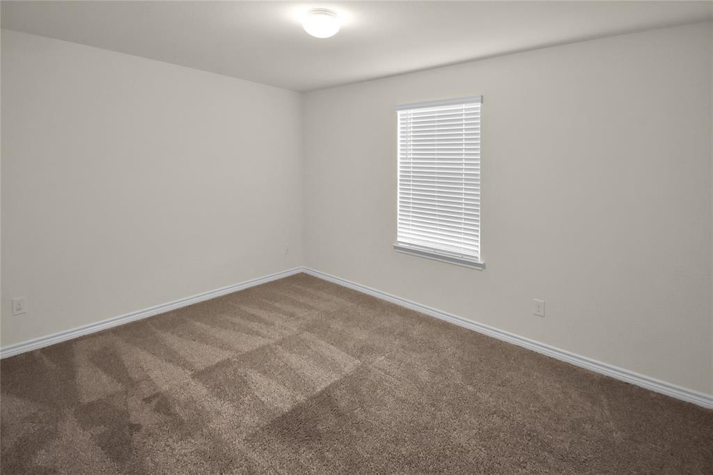 604 Gunsmoke Trail Princeton, TX 75407 - Photo 13 of 25 an empty room with a window