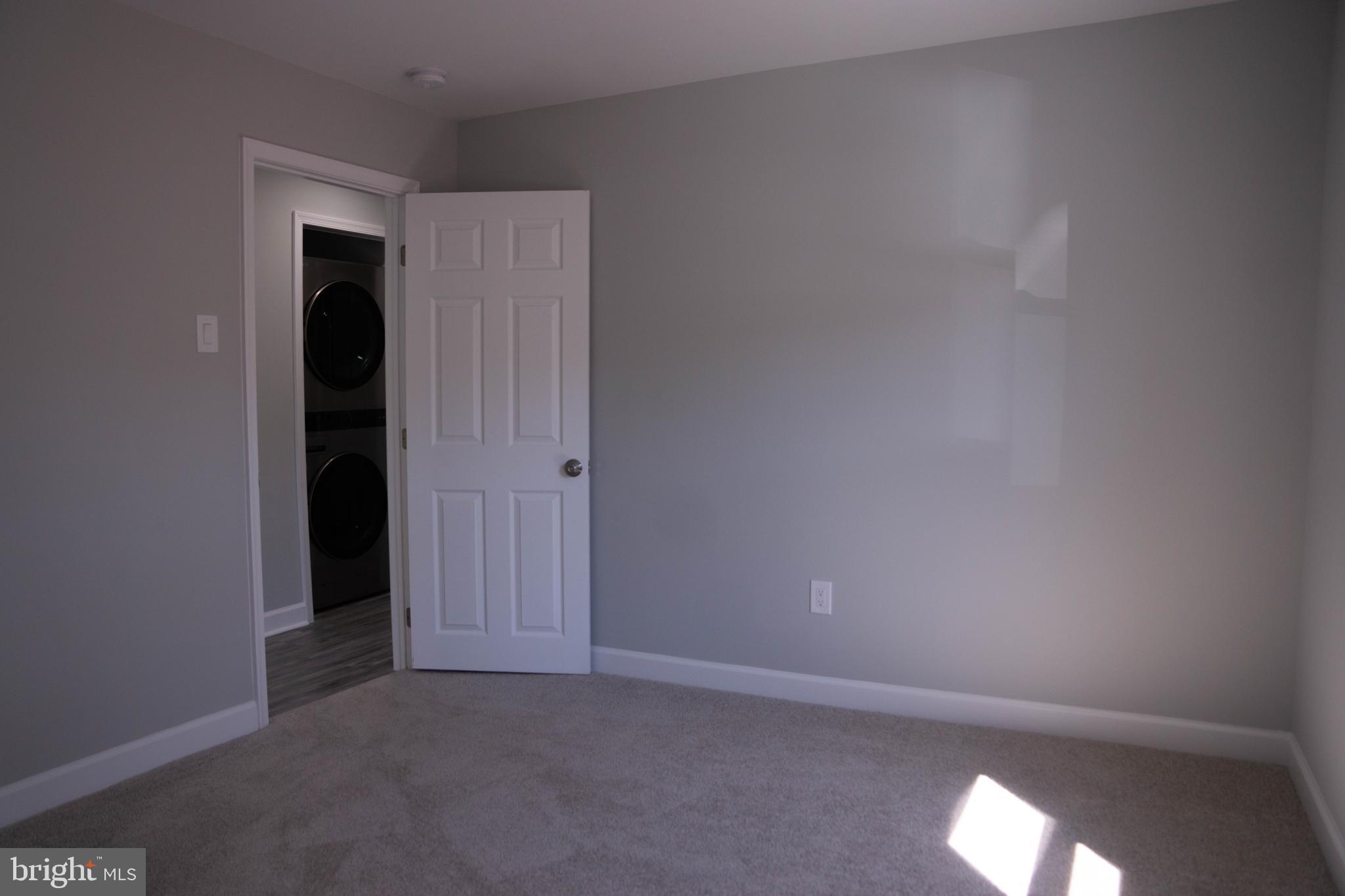 1009 Main Street, Unit 1 Fallston, MD 21047 - Photo 7 of 19 an empty room with an entryway