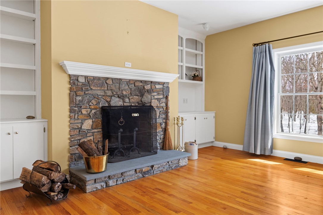 30 Fox Ridge Circle South Kingstown, RI 02879 - Photo 17 of 38 The great room overlooks the beautiful backyard.