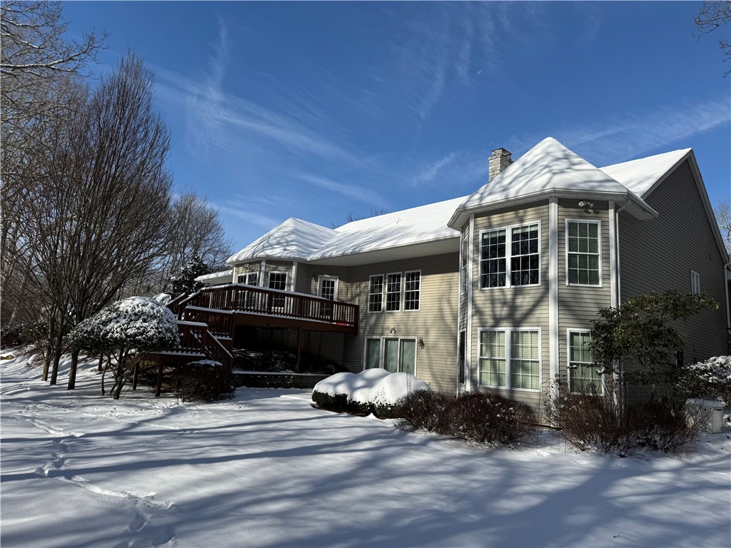 30 Fox Ridge Circle South Kingstown, RI 02879 - Photo 4 of 38 The deck is off of the eat-in kitchen. There's also a lovely patio at the walkout basement.