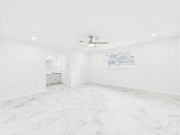 a bathroom with a sink vanity and a mirror