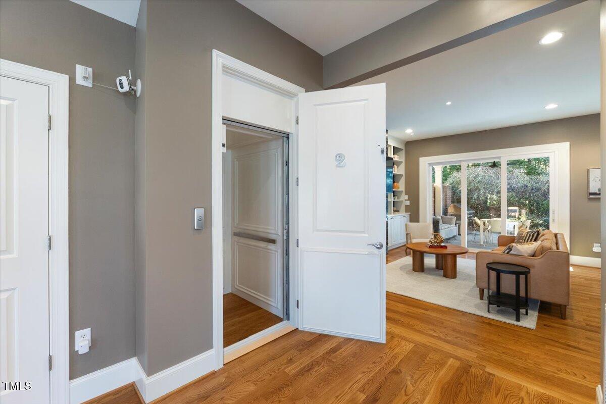 255 Penley Circle Raleigh, NC 27609 - Photo 11 of 35 a view of a livingroom with furniture and floor to ceiling window