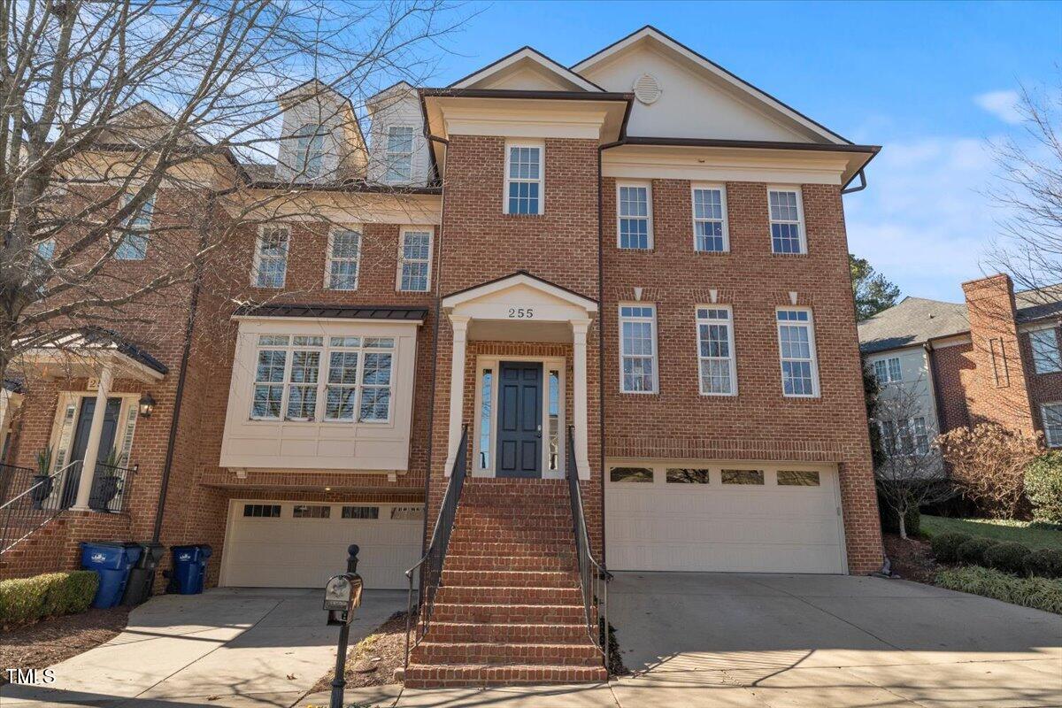 255 Penley Circle Raleigh, NC 27609 - Photo 31 of 35 a front view of a house with a yard