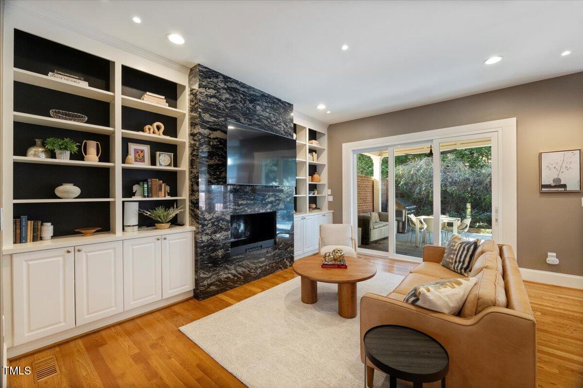 255 Penley Circle Raleigh, NC 27609 - Photo 4 of 35 a living room with furniture and a fireplace