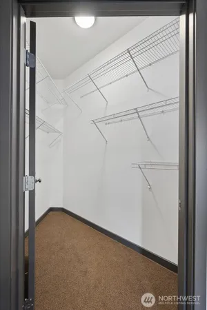 a view of a room with racks on the wall