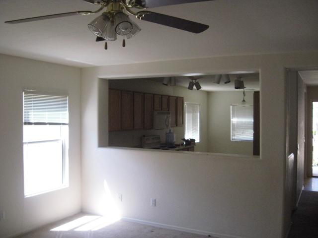 2741 East Bagdad Road Queen Creek, AZ 85143 - Photo 4 of 9 living room facing kitchen