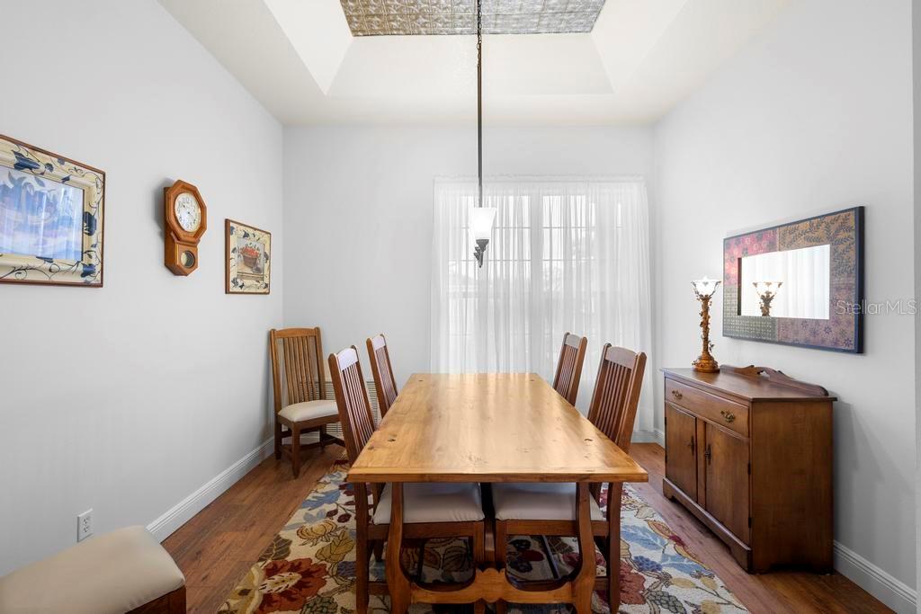 11767 Southeast 176th Place Road Summerfield, FL 34491 - Photo 16 of 37 DINING ROOM SHOWING TIN COFFERED CEILING