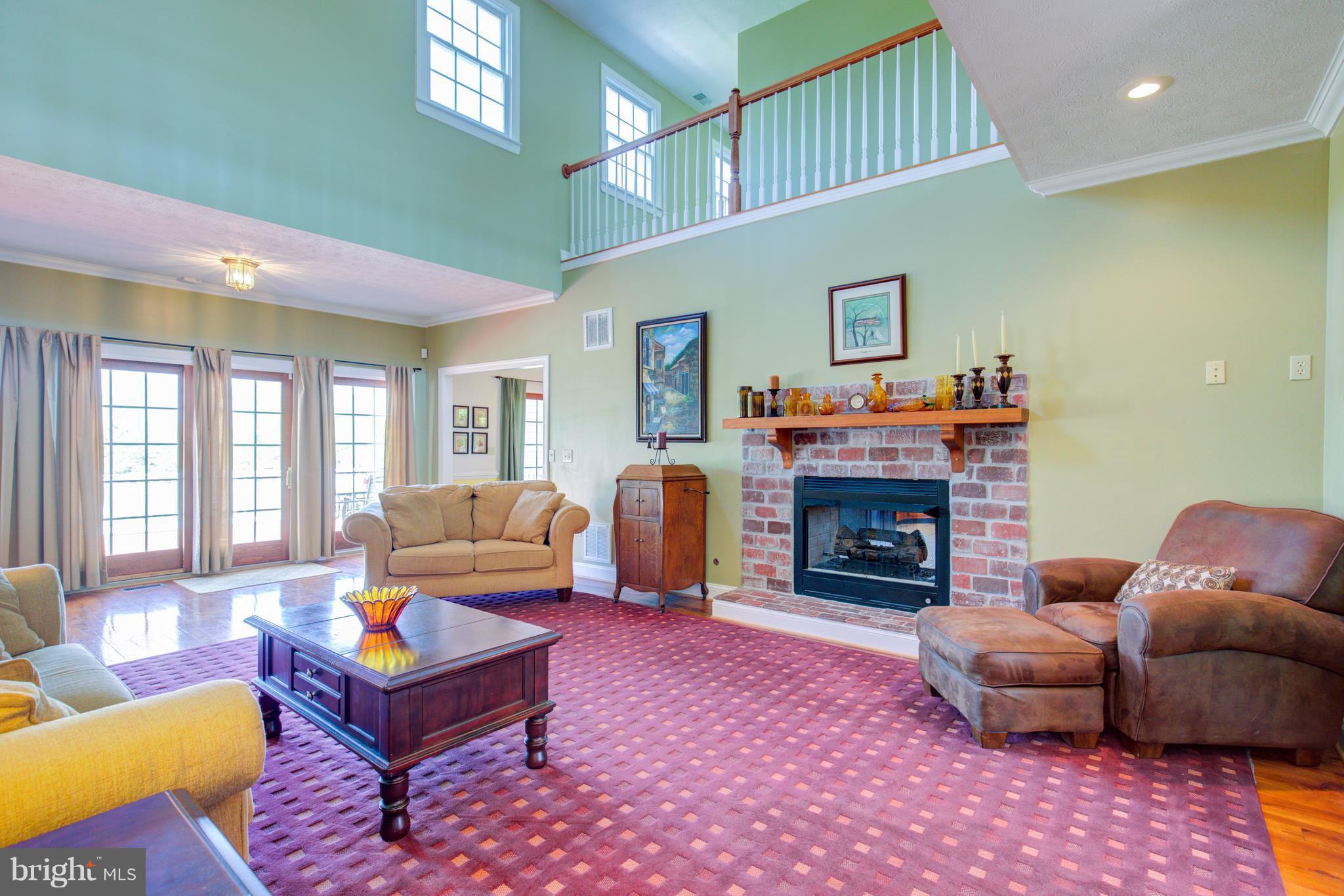 860 Apple Pie Ridge Road Winchester, VA 22603 - Photo 12 of 29 2-STORY LIVING ROOM W/DOUBLE SIDED FIREPLACE