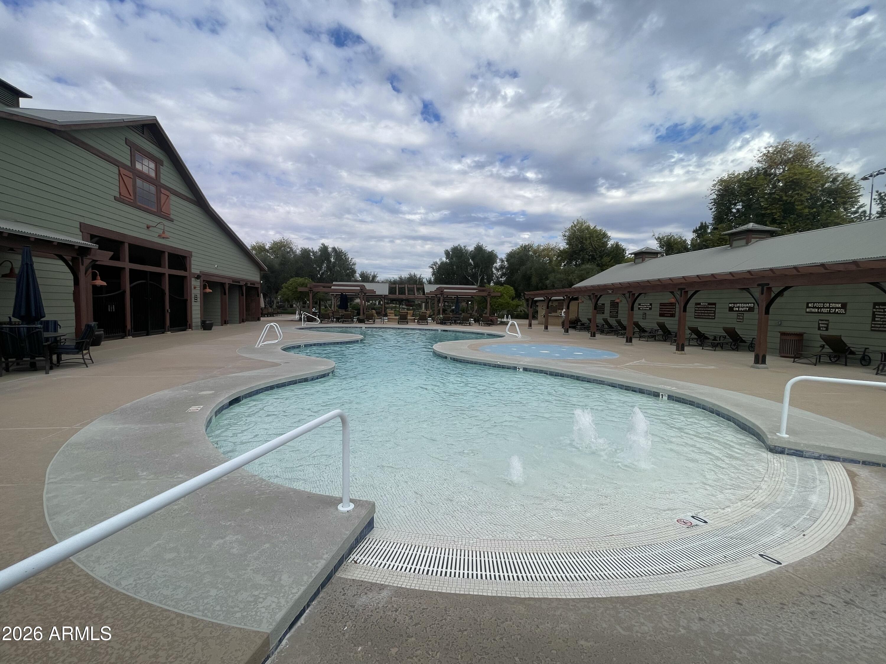 14400 West Bloomfield Road Surprise, AZ 85379 - Photo 35 of 38 a view of a swimming pool with furniture