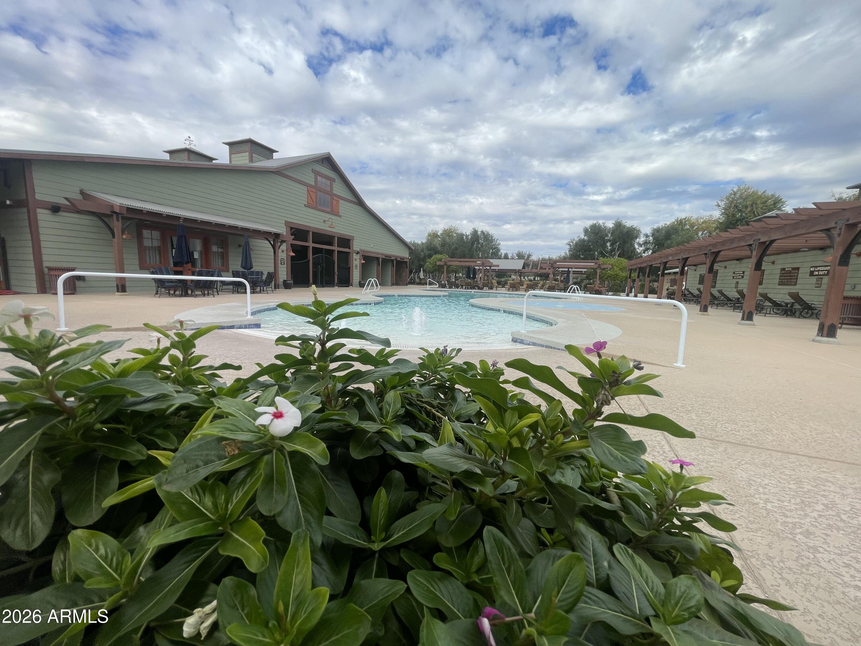 14400 West Bloomfield Road Surprise, AZ 85379 - Photo 37 of 38 a front view of a house with garden