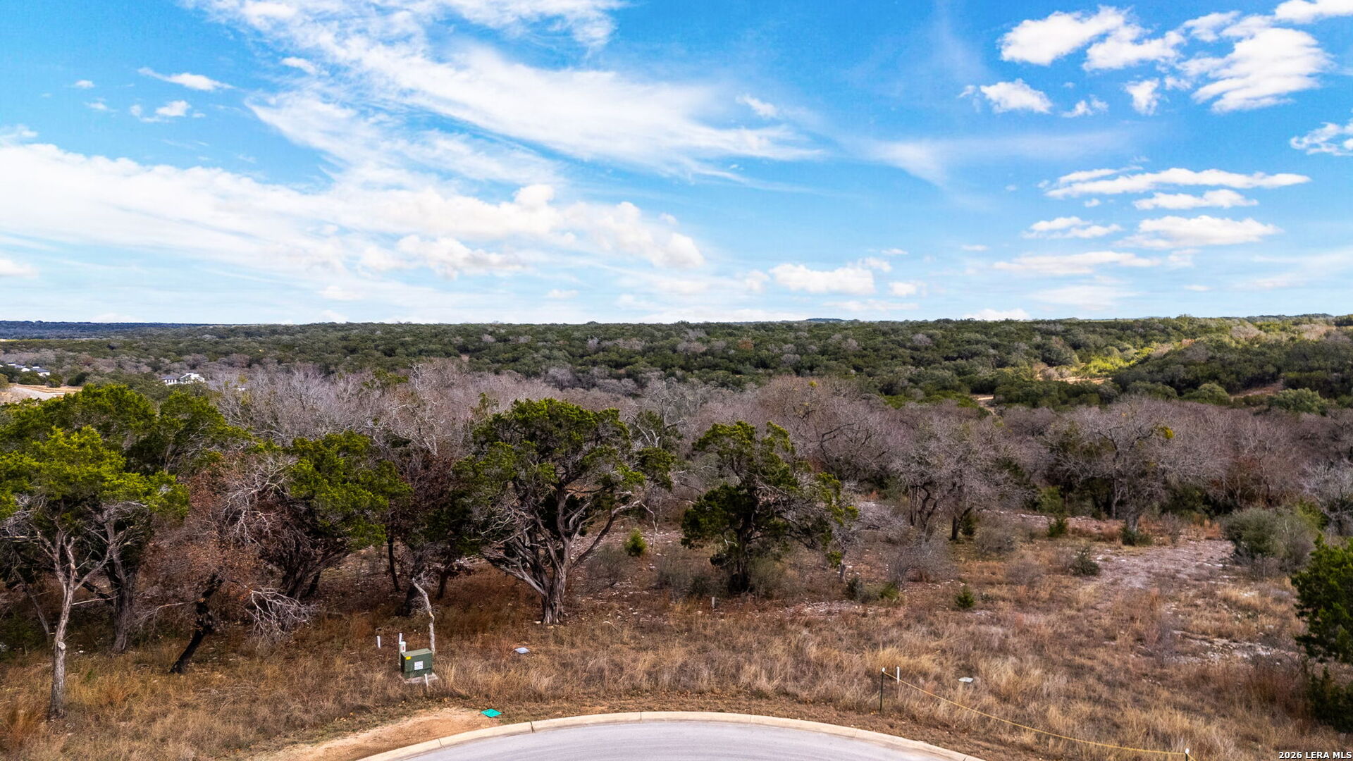Lot 12 Landmark Ridge Bergheim, TX 78004 - Photo 7 of 16 a view of a lake with a forest