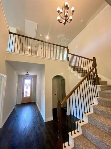 a kitchen with appliances and cabinets