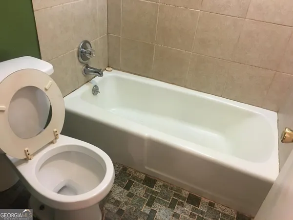 a bathroom with a bathtub