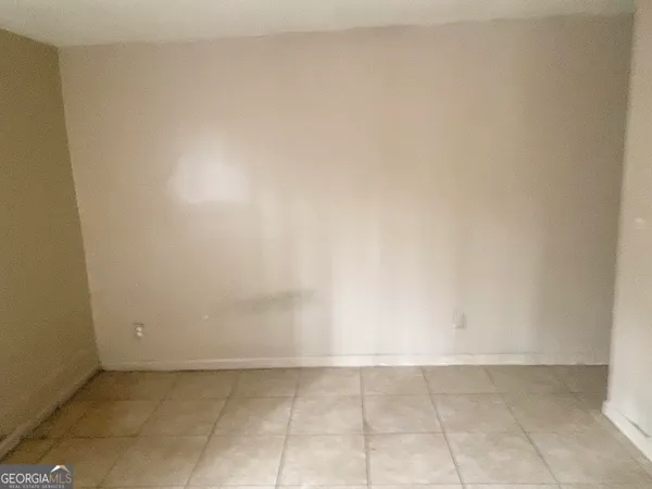 a view of a closet area with front door