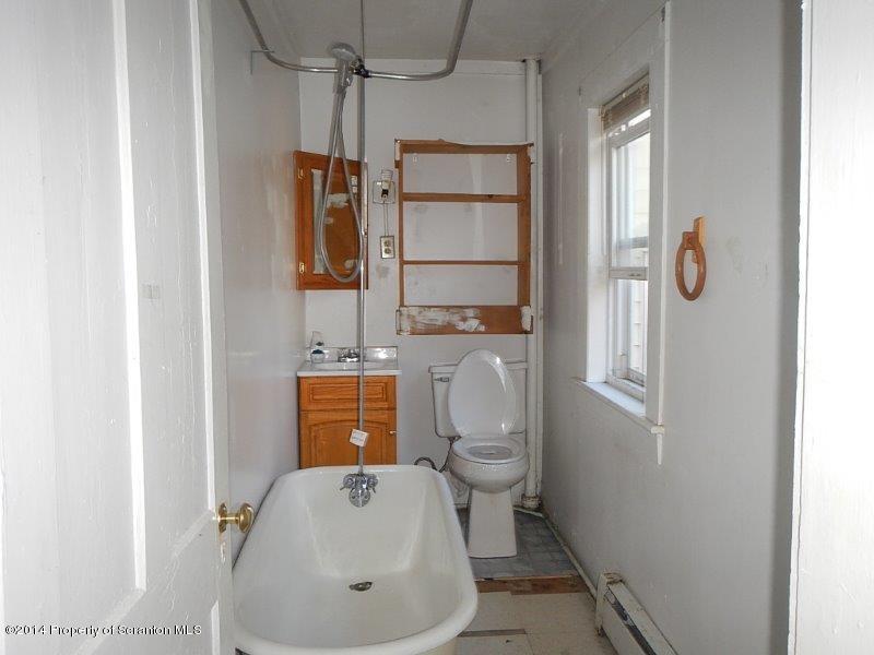 206 Ridge Street Honesdale, PA 18431 - Photo 23 of 25 a bathroom with a toilet and a sink