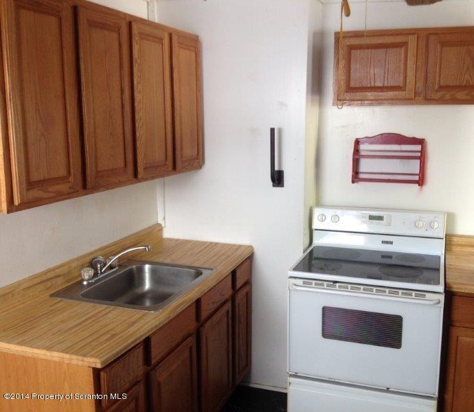 206 Ridge Street Honesdale, PA 18431 - Photo 7 of 25 a kitchen with a stove and a sink