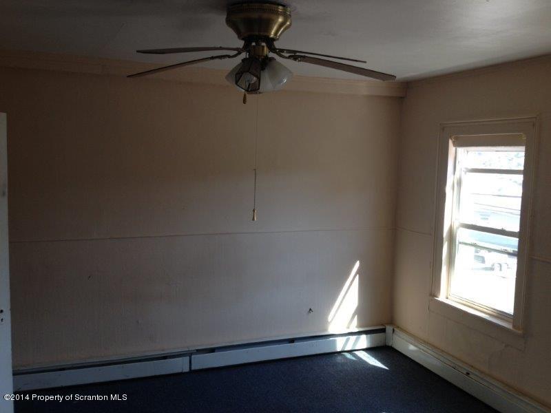 206 Ridge Street Honesdale, PA 18431 - Photo 8 of 25 a room with a window and a ceiling fan