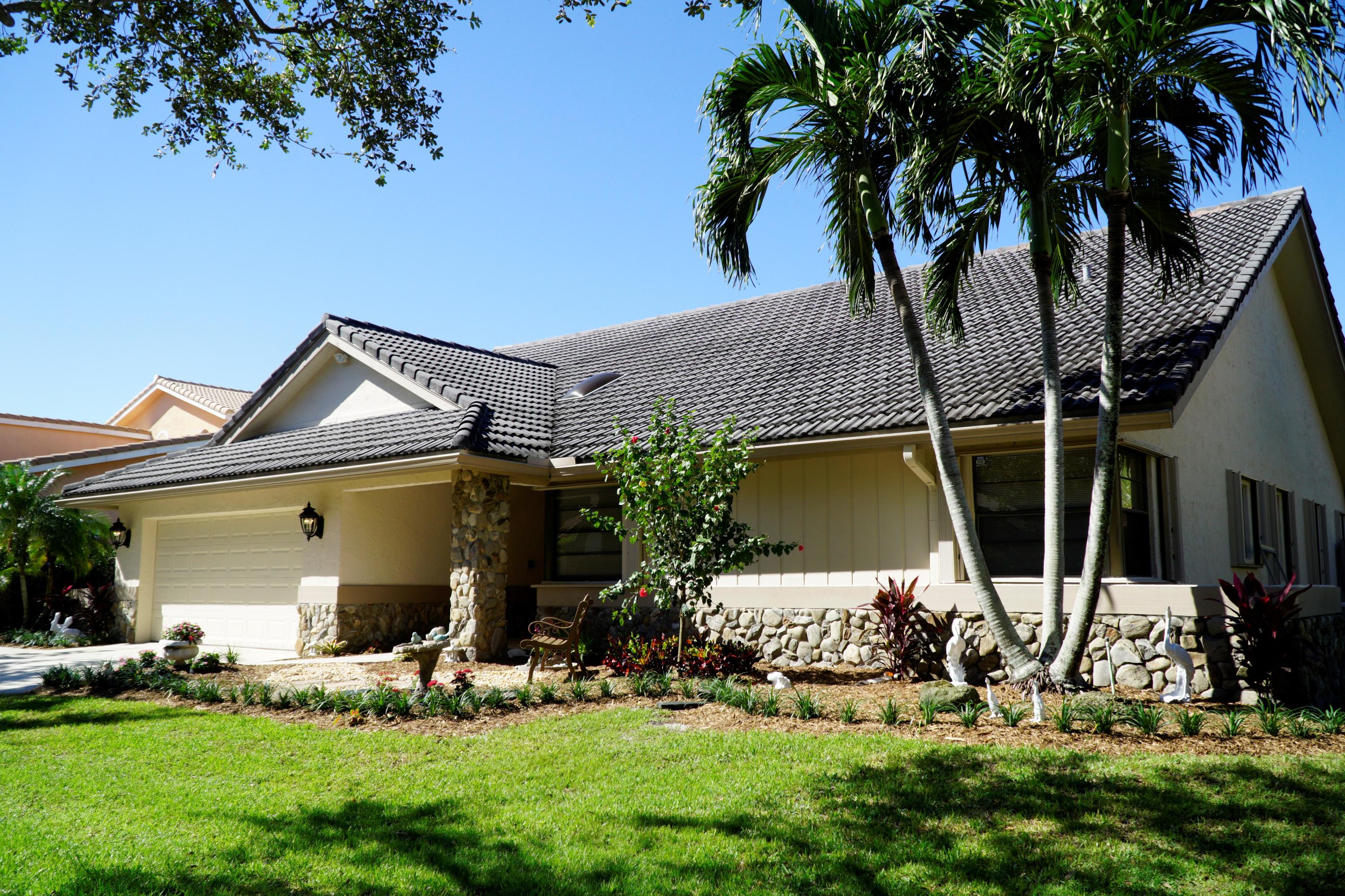 4355 Northwest 25th Way Boca Raton, FL 33434 - Photo 2 of 36 Side view front