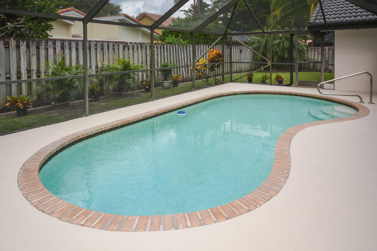 4355 Northwest 25th Way Boca Raton, FL 33434 - Photo 26 of 36 Screened-in pool