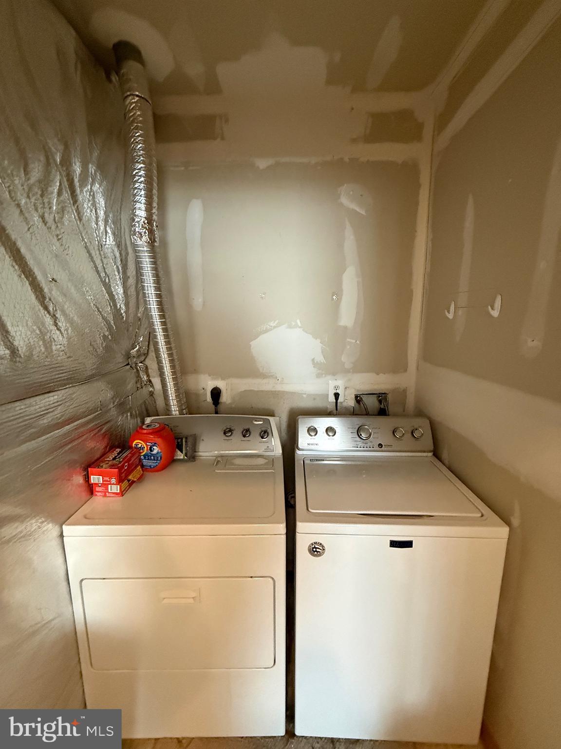 4617 Hummingbird Lane, Unit 110 Fairfax, VA 22033 - Photo 18 of 45 a utility room with washer and dryer
