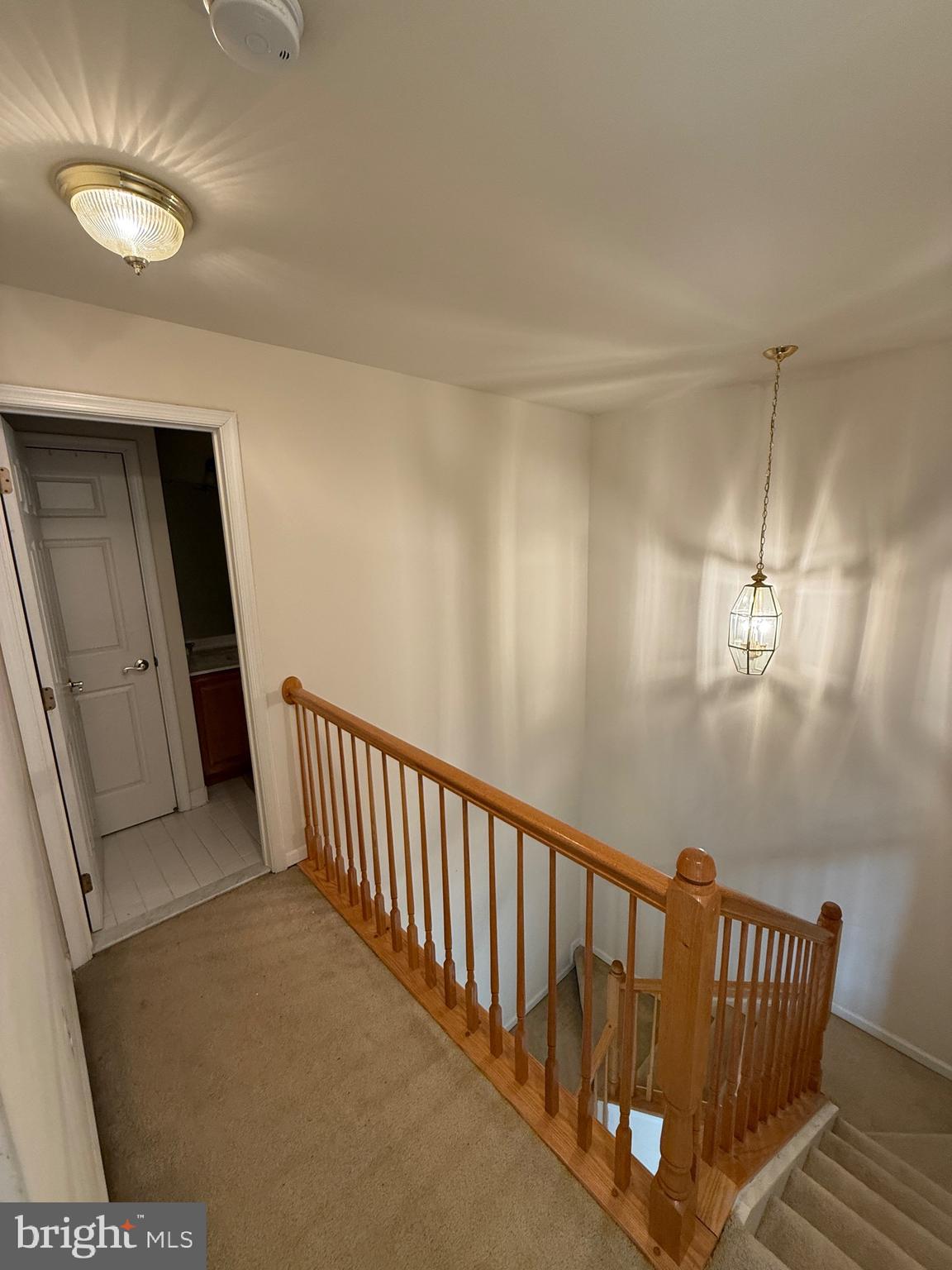 4617 Hummingbird Lane, Unit 110 Fairfax, VA 22033 - Photo 41 of 45 a view of hallway with stairs