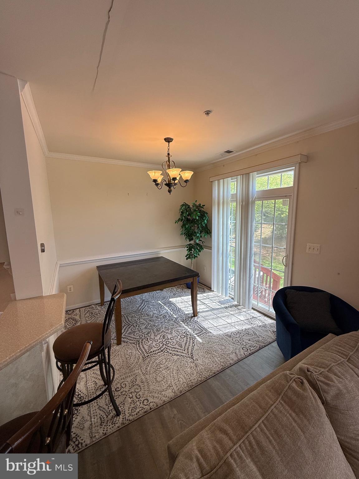 4617 Hummingbird Lane, Unit 110 Fairfax, VA 22033 - Photo 9 of 45 a bedroom with furniture and a window