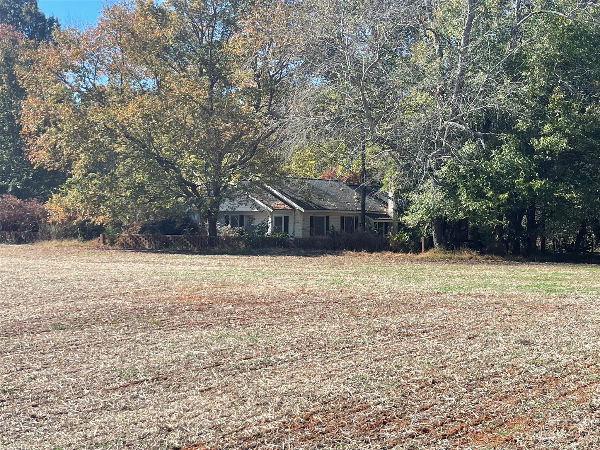2640 Graham Road, Unit 4 Mount Ulla, NC 28125 - Photo 1 of 7 a backyard of a house