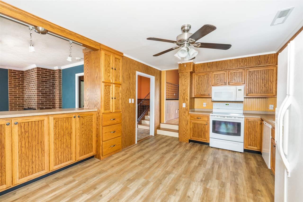 1959 Shutterlee Mill Road Staunton, VA 24401 - Photo 25 of 50 a view of a kitchen with a sink and a window