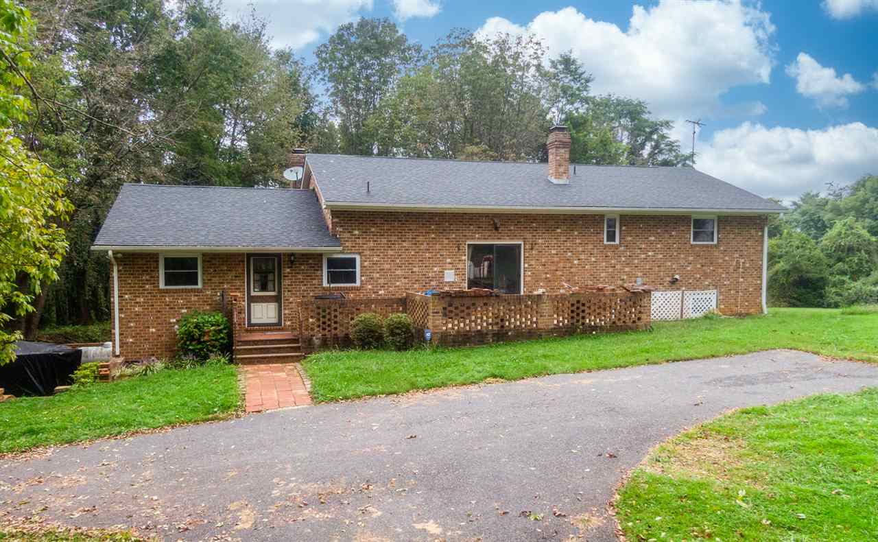 1959 Shutterlee Mill Road Staunton, VA 24401 - Photo 31 of 50 a front view of a house with a yard